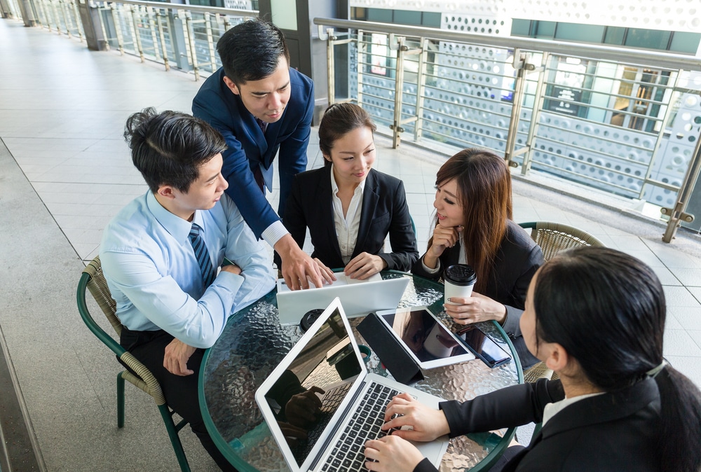 FMP people working ina an office during a meeting